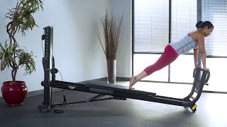 Knee Tucks with Toe Bar